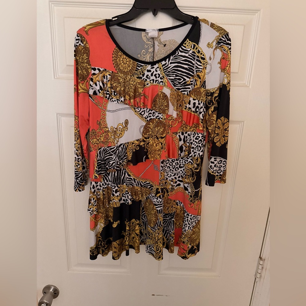 Rene’s Creation Multicolor design top with a zebra and leopard chain print.